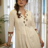 Classy Cotton Flex Off-White Kurta With Embroidered Yoke And Sleeves Paired With Printed Pant