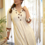 Classy Cotton Flex Off-White Kurta With Embroidered Yoke And Sleeves Paired With Printed Pant